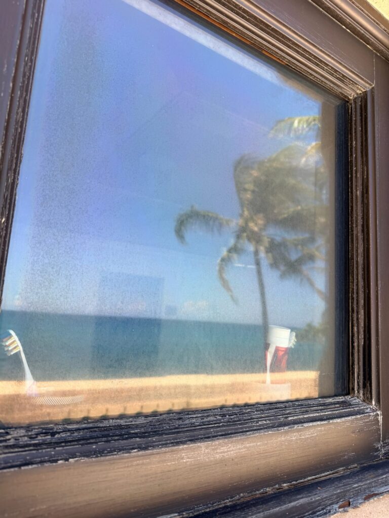 Hazy, spotted oceanfront window glass before polishing in Jupiter, FL